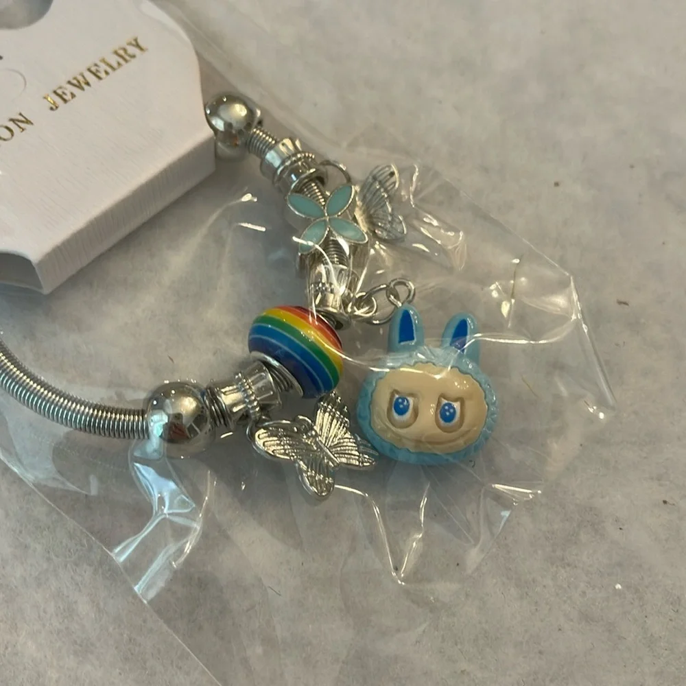 Silver Labubu Monster cartoon Charm Bracelet with blue and Rainbow Accents nwt